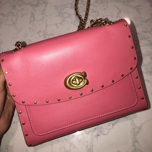 Small pink Coach crossbody orchid bag
